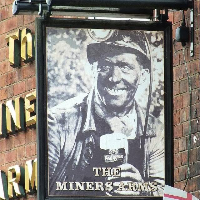 Traditional miner pub sign